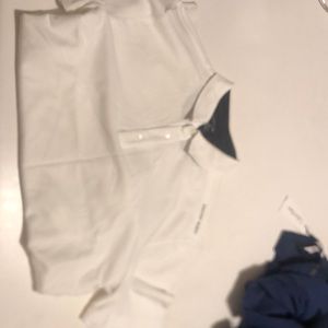 BRAND NEW CALVIN KLEIN POLO. BRIGHT WHITE